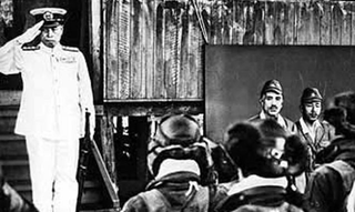 Admiral Yamamoto salutes Japanese naval pilots at Rabaul, just hours before his aircraft was shot down by US Army Air Forces pilots.